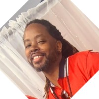 Professional headshot of Sir Washington